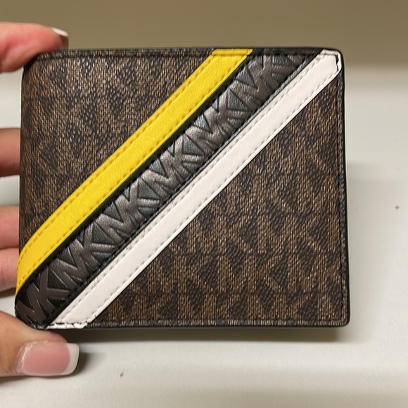 NWT $178 Michael Kors Cooper Logo Brown/Lemon PVC Billfold with Passcase Wallet - Picture 1 of 5